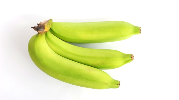 Groene banaan op witte achtergrond.