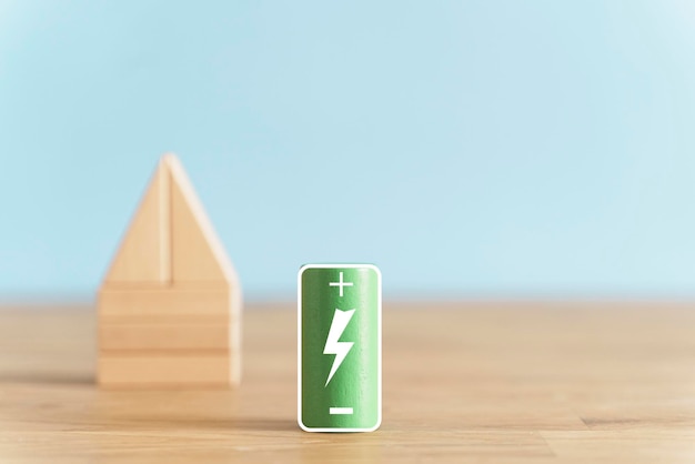 Groene energie huisconcept Houten huizen met een groene batterij Duurzaam slim huis
