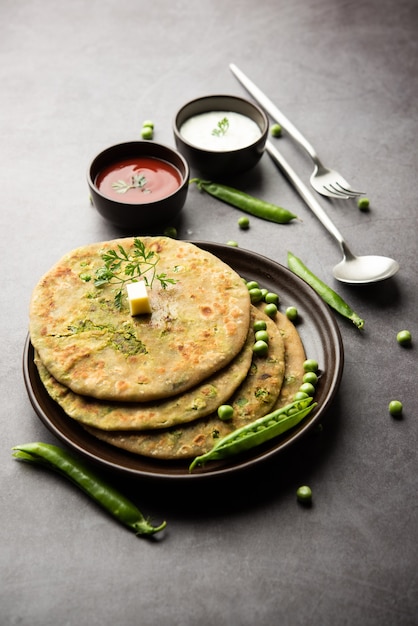 Groene erwten of matar ka paratha is een Punjabi-gerecht, een Indiase ongezuurde flatbread gemaakt met volkoren meel, groene erwten. Geserveerd met ketchup en wrongel