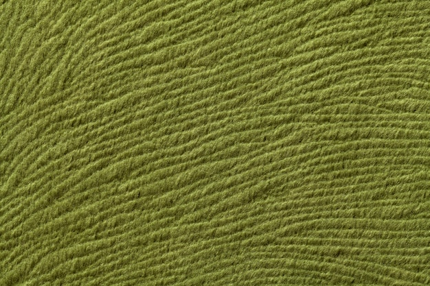 Groene olijfachtergrond van zacht textielmateriaal, Stof met natuurlijke textuur,