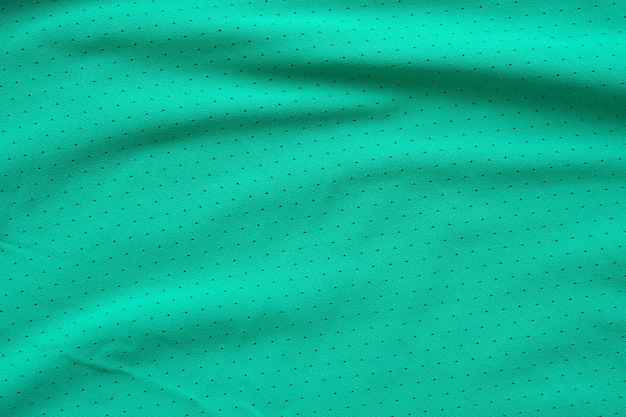 Groene sportkleding stof voetbalhemd trui textuur achtergrond