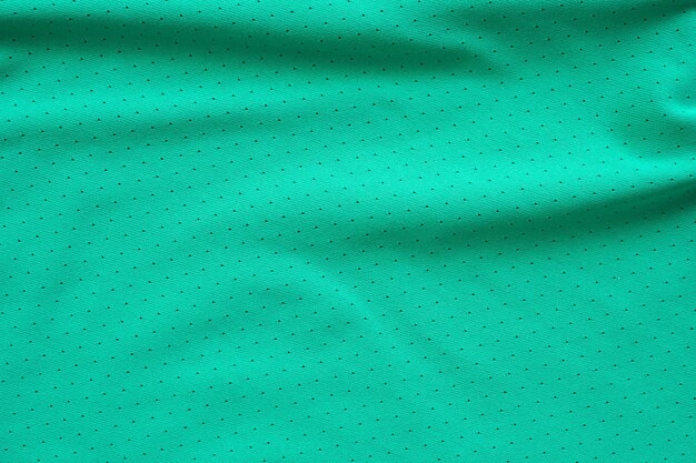 Groene sportkleding stof voetbalshirt jersey textuur achtergrond