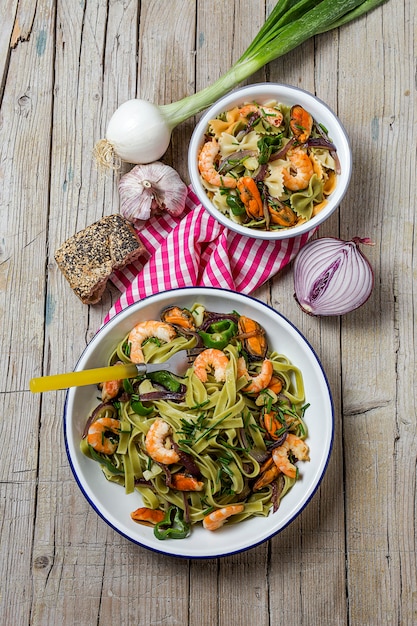 Groene tagliatelle met zeevruchten.