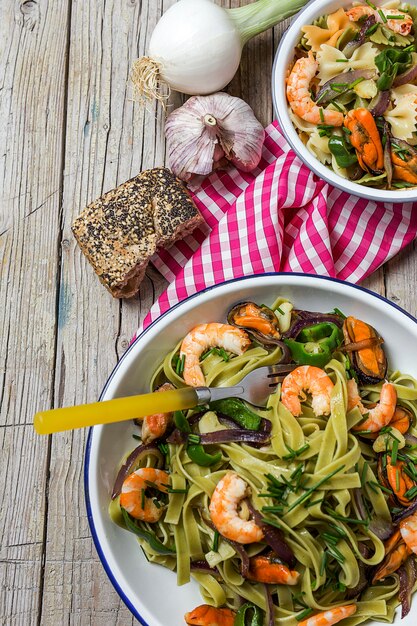 Groene tagliatelle met zeevruchten.