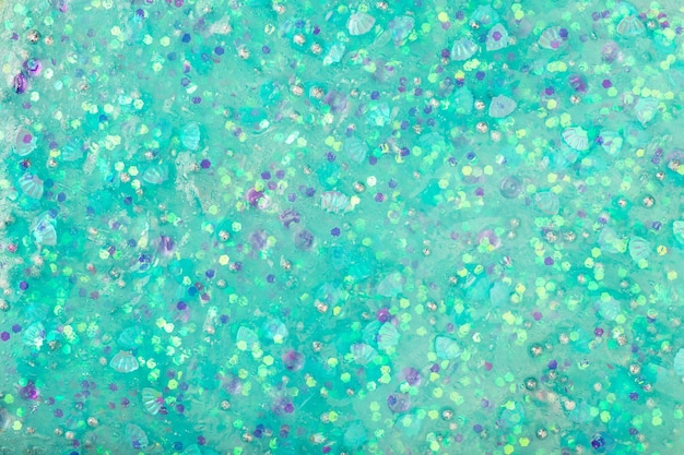 Groene turkoois glitter slijm achtergrond kleverige flexibele stof abstracte textuur