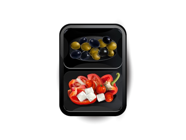 Groenten en fetakaas in een lunchbox die op witte achtergrond wordt geïsoleerd