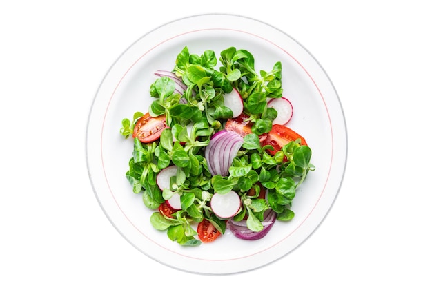 groentesalade tomaat, radijs, mache sla, groene bladeren snack verse maaltijd eten op tafel