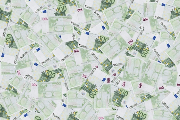 Foto groep van 100 eurobiljetten achtergrond van bankbiljetten in 100 euro geld textuur europese munt