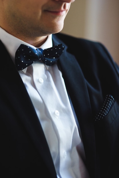 Groom in black suit