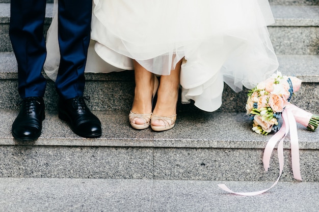 Groom and bride on stairs