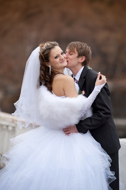 Groom and the bride during walk in their wedding day