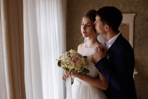 groom kisses the bride