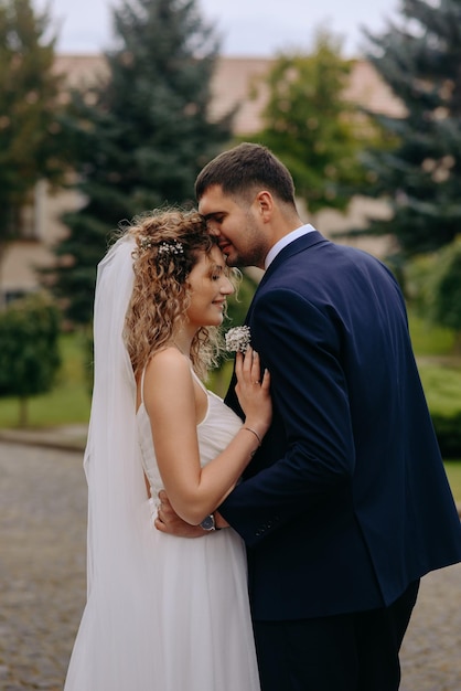 the groom kisses the bride