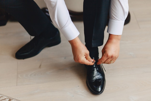 Photo groom meeting, details, jacket, shoes, watches and buttons on the wedding day