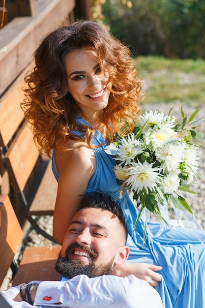 Groomsmen and bridesmaid having fun on wedding ceremony