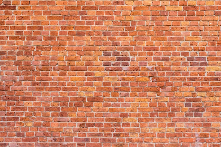 Foto grote achtergrond van een oude bakstenen muur