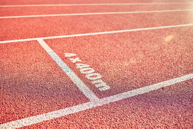 Ground field and race track road in stadium for fitness running track and sports with nobody Pattern texture and background of empty racecourse with no people for exercise workout and training