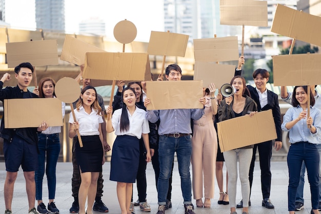 Group of activists with banners protesting to democracy and equality 