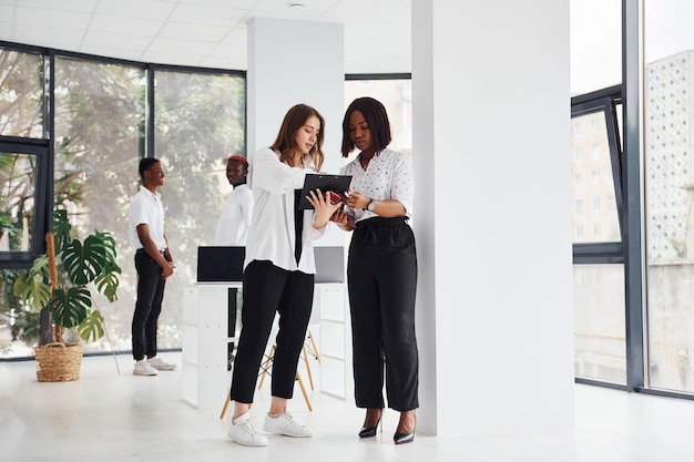 Group of african american business people working in office together