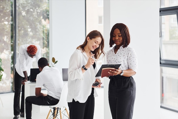 Group of african american business people working in office together