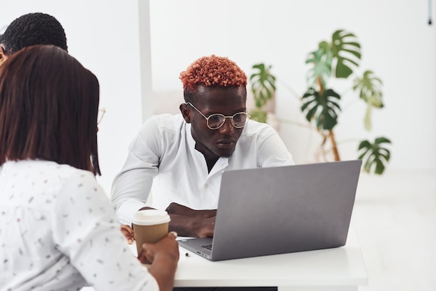 Group of african american business people working in office together