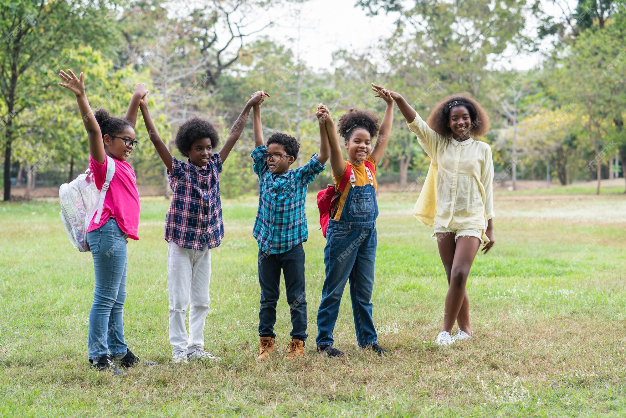 A group of african children playing in a park