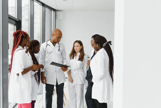 Group of african american doctor and nurse in hospital ward