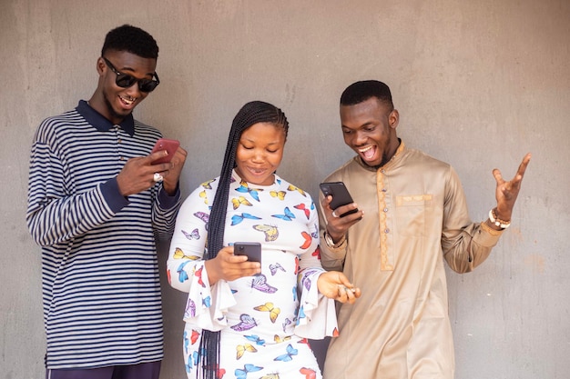 group of african students excited about what they saw on the phone