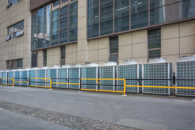 Group of air conditioner outdoor units outside of building