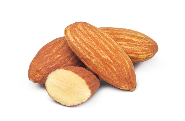 Group of almonds isolated on white background