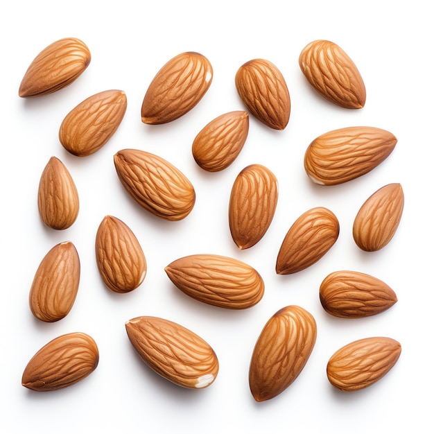 a group of almonds on a white surface