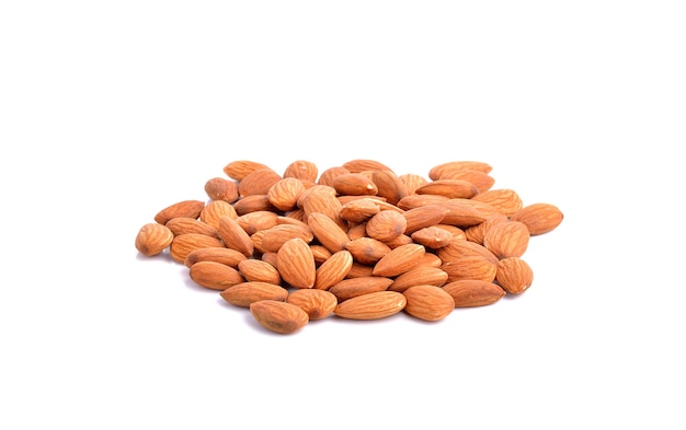 Group of almonds on white wall