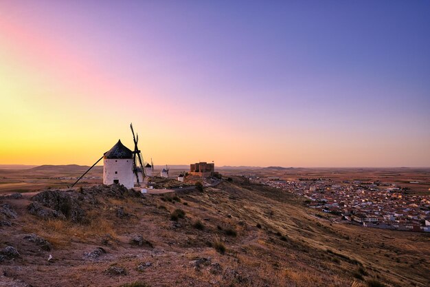 Group of ancient windmills in the town of Consuegra Spain on the route of the Don Quixote