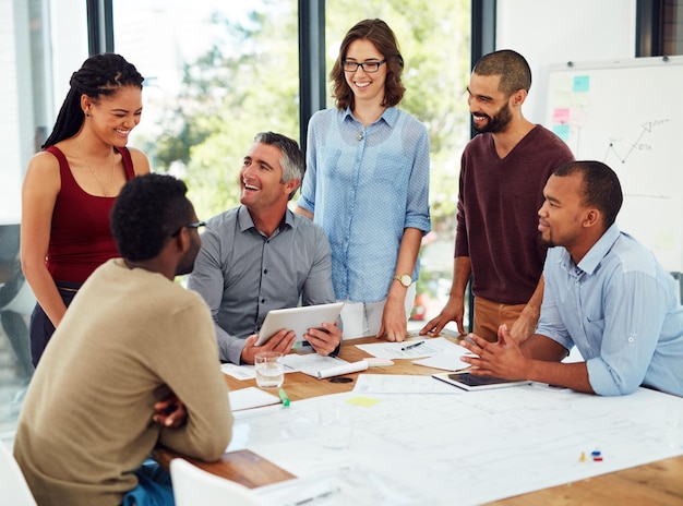 group architect and discussion for blueprint tablet and teamwork for floor plan smile and office digital documents and people in boardroom designer and collaboration of colleagues and project