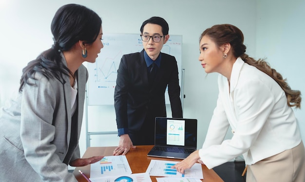 group of asian business people meeting about business plan and present