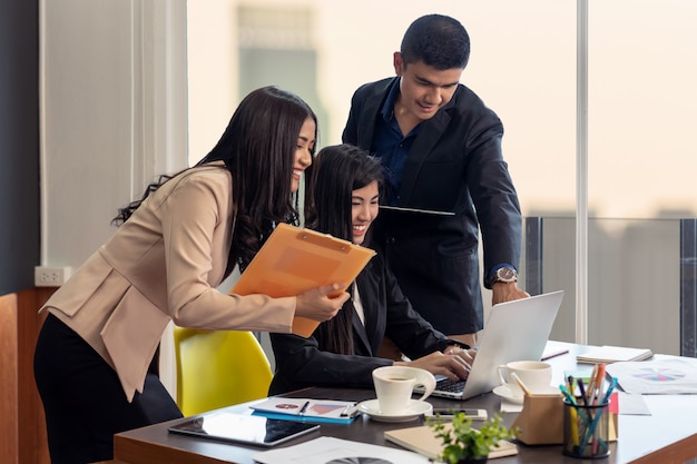 Group Of Asian and Multiethnic Business people with formal suit working and brainstorming together