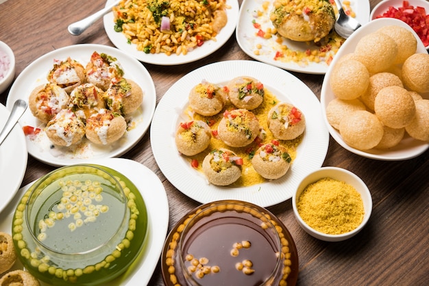 Group of Bombay chat food includes golgappa or panipuri, bhel-puri, sev-poori, dahipuri, Ragda pattice, raj kachori etc. selective focus