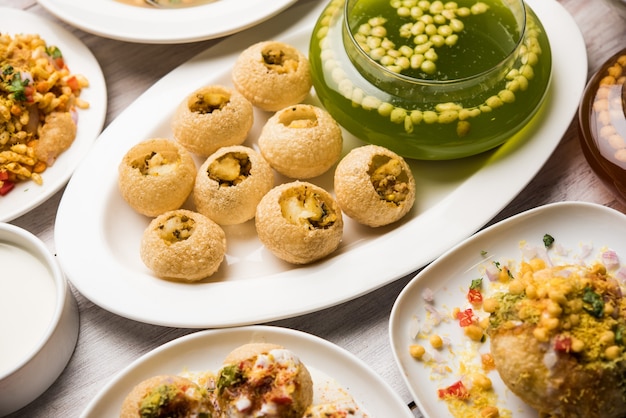 Group of Bombay chat food includes golgappa or panipuri, bhel-puri, sev-poori, dahipuri, Ragda pattice, raj kachori etc. selective focus