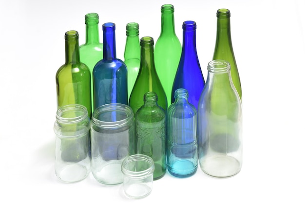 Group of bottles and pots on white background