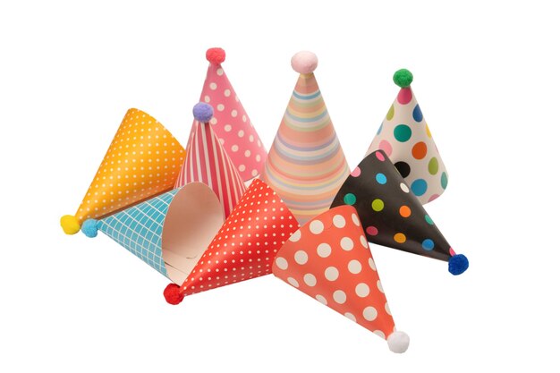 A group of bright and colorful birthday caps isolated on a white background