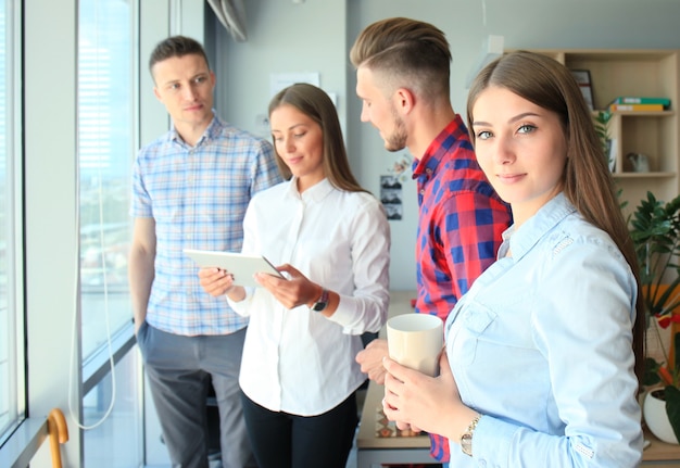 Group of buisness people working on tablet