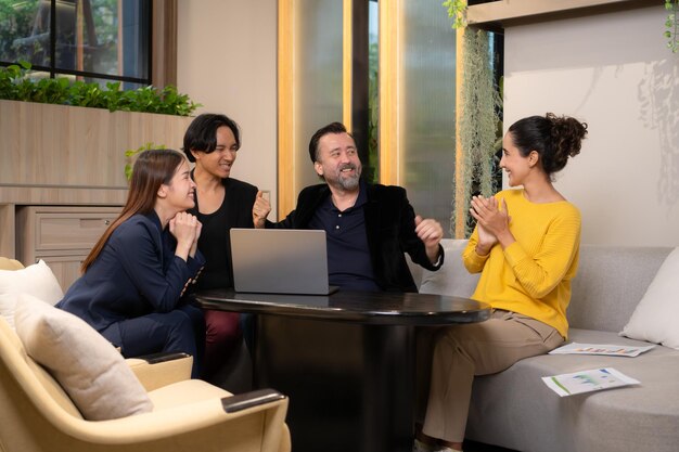 Photo group of business people discussing business plan at meeting table in office