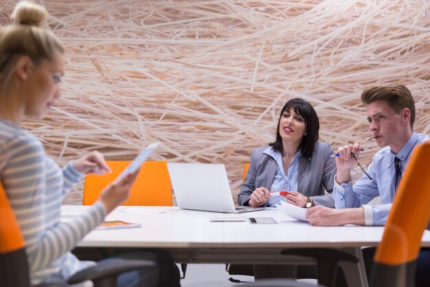 Group of business people discussing business plan  in the office