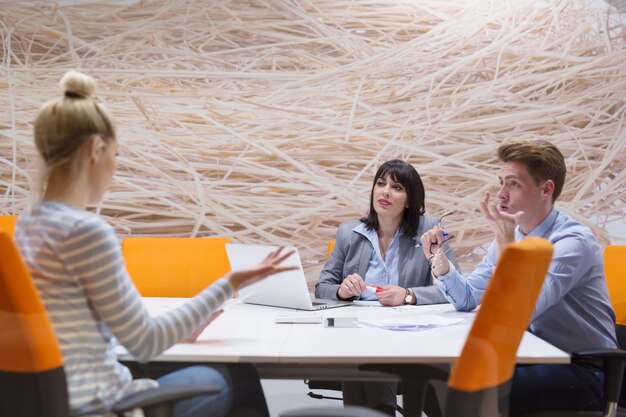 Group of business people discussing business plan  in the office