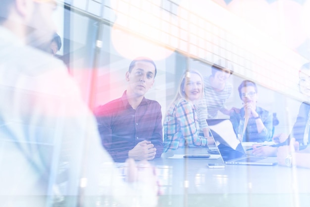 Group of business people discussing business plan  in the office