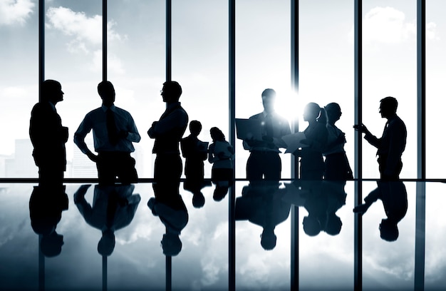 Photo group of business people discussing in a conference room.