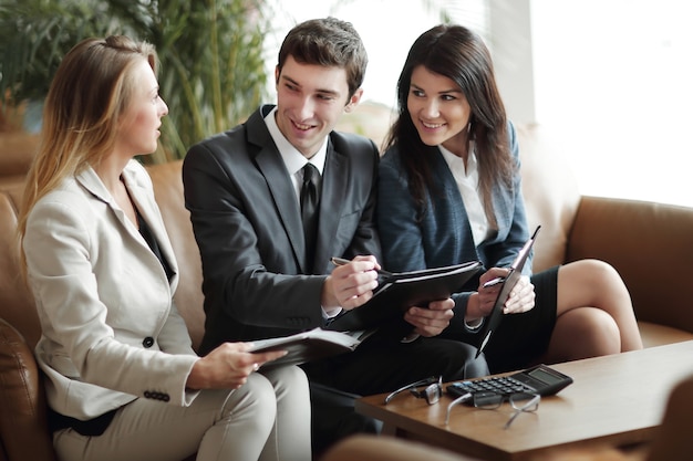 group of business people discussing the document in the Bank hall.business concept