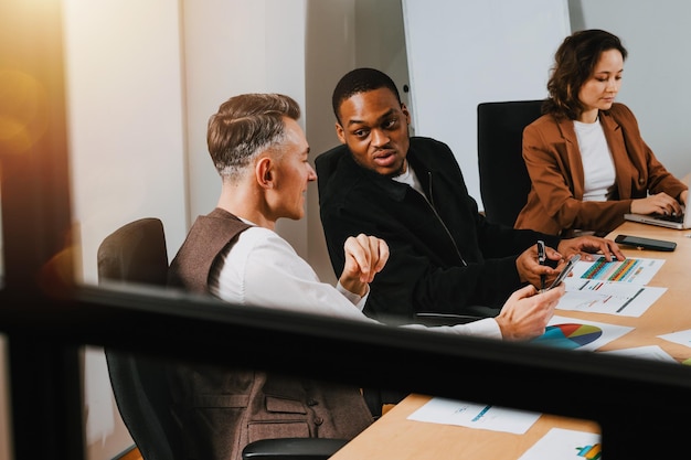 Group of business people have a meeting about company statistics