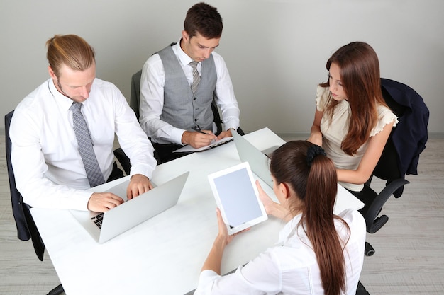 Group of business people having meeting together