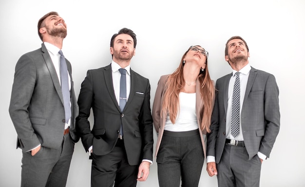 Group of business people looking up at a copy space